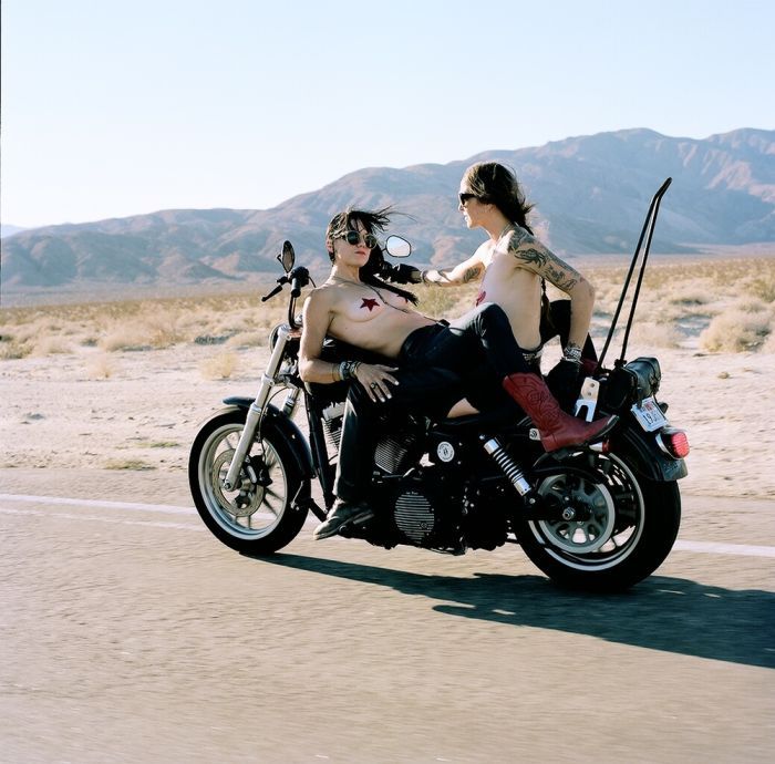 Girls on a motorcycle in Panjihua