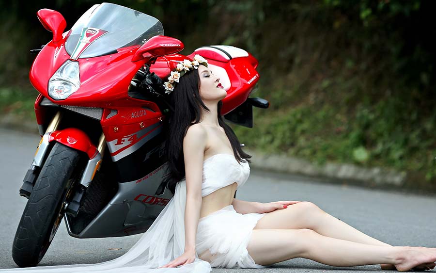 Beautiful girls and motorcycles in Panjihua